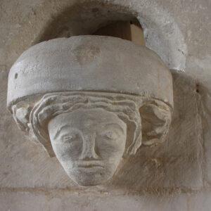 A carved stone head inside a Lincolnshire church